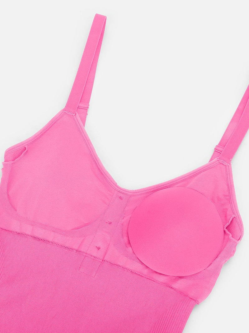 Mono sin costuras que moldea la cintura y el abdomen, levanta los glúteos y da soporte al busto.