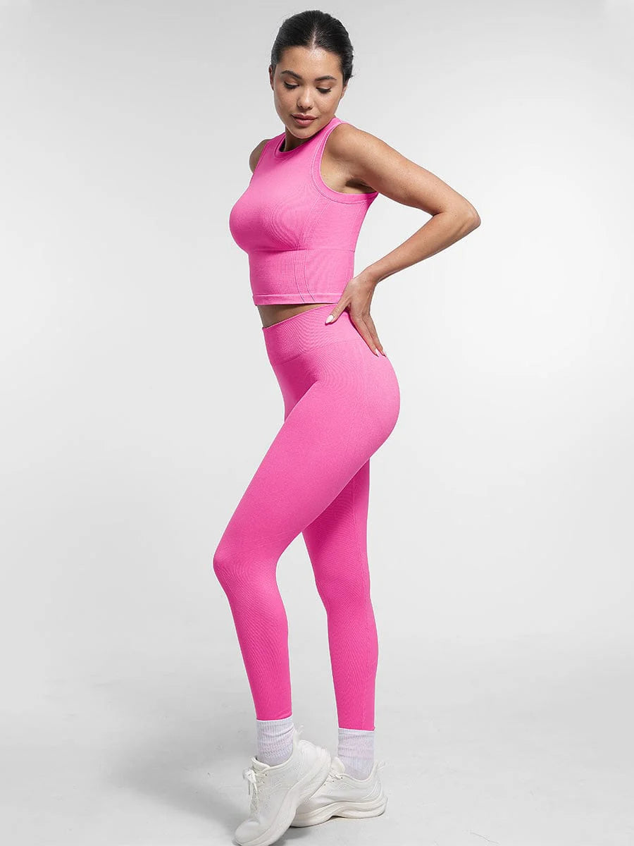 Top deportivo de soporte sin costuras con sujetador incorporado y copas extraíbles.