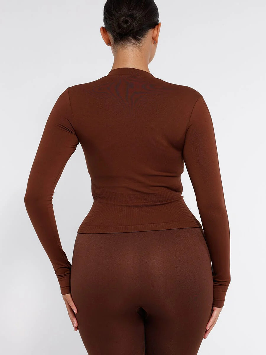 Top de running con cremallera completa sin costuras y orificios para los pulgares