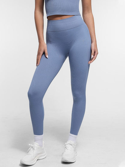 Leggings de yoga moldeadores de glúteos color melocotón con cintura doble sin costuras