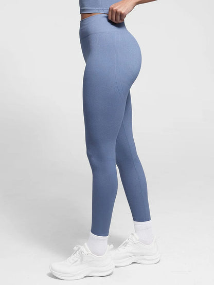 Leggings de yoga moldeadores de glúteos color melocotón con cintura doble sin costuras