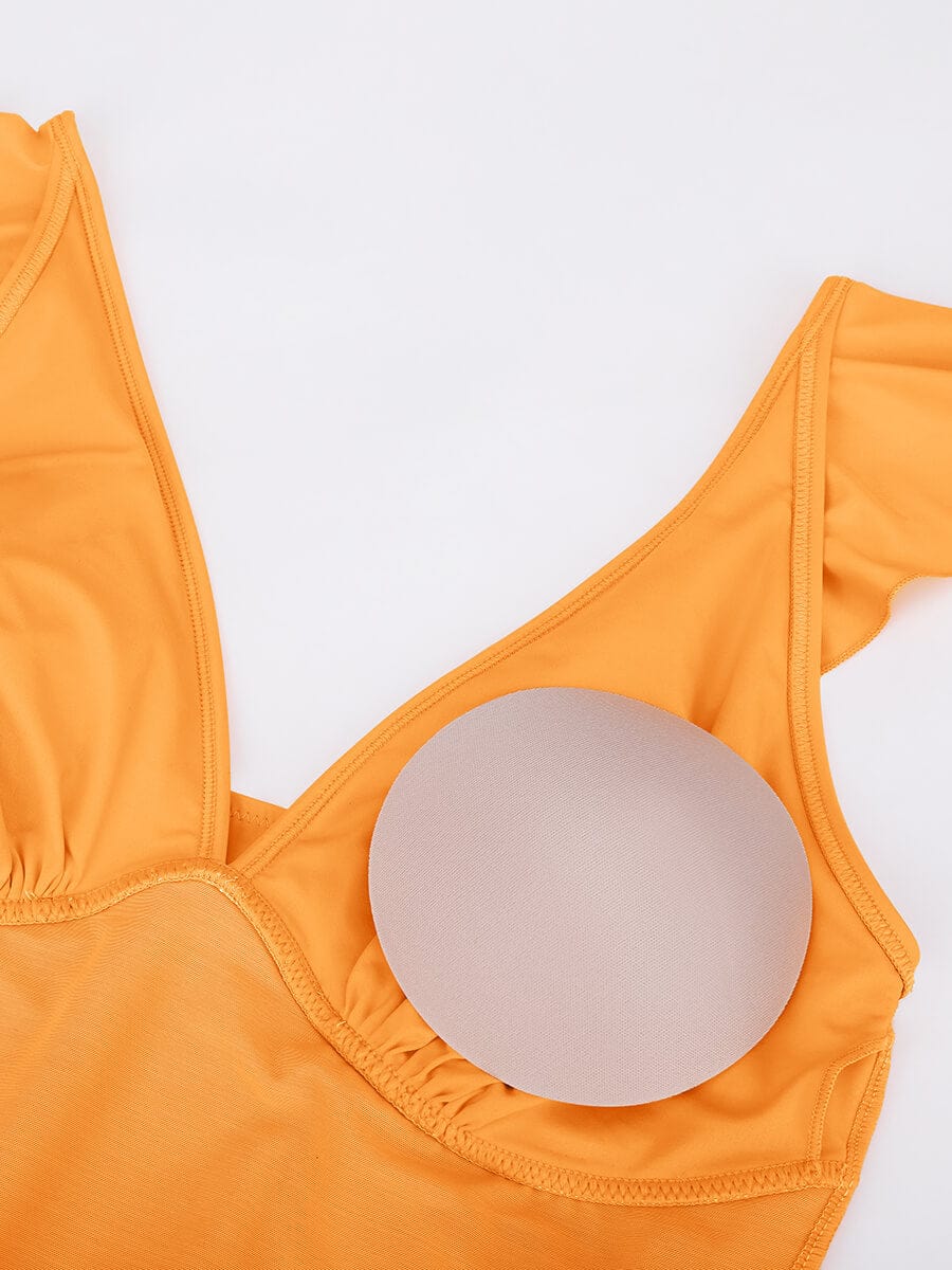 Traje de baño de una pieza con volantes, cuello en V y cordones