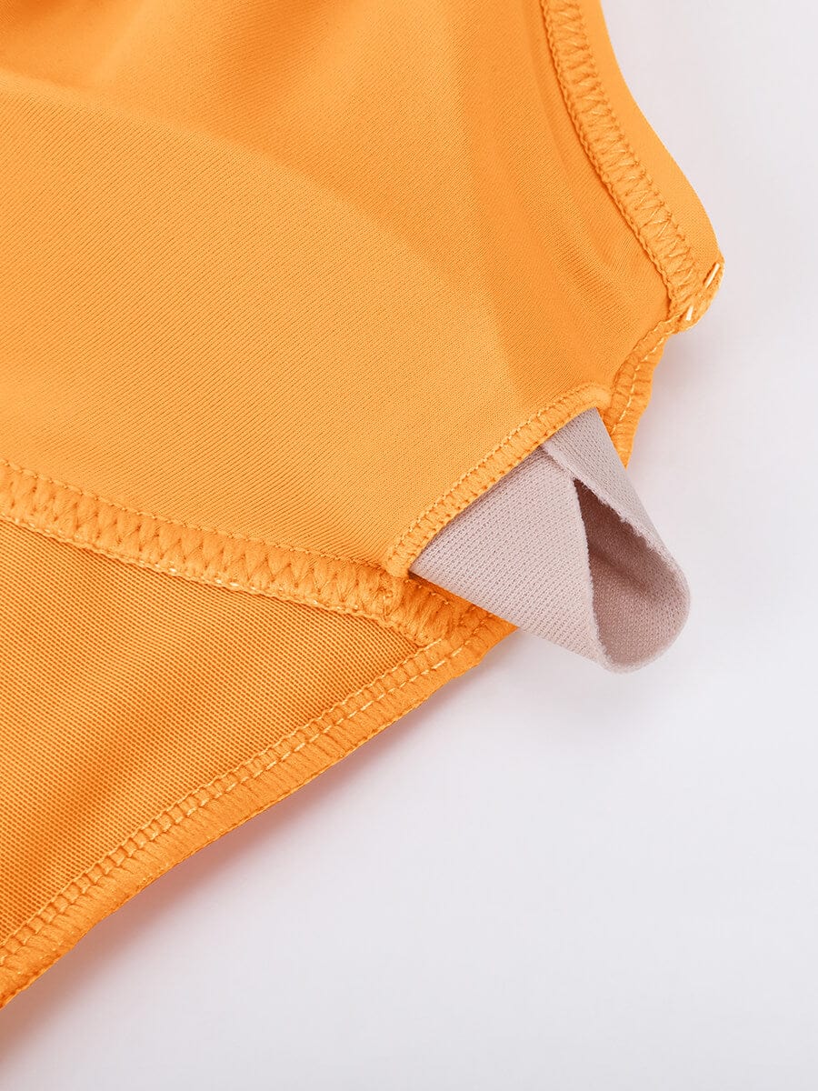 Traje de baño de una pieza con volantes, cuello en V y cordones