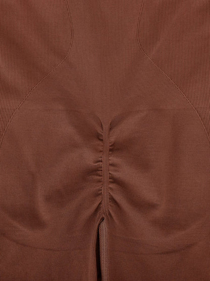 Mono deportivo moldeador 2 en 1 con espalda nadadora, largo completo y cremallera frontal sin costuras